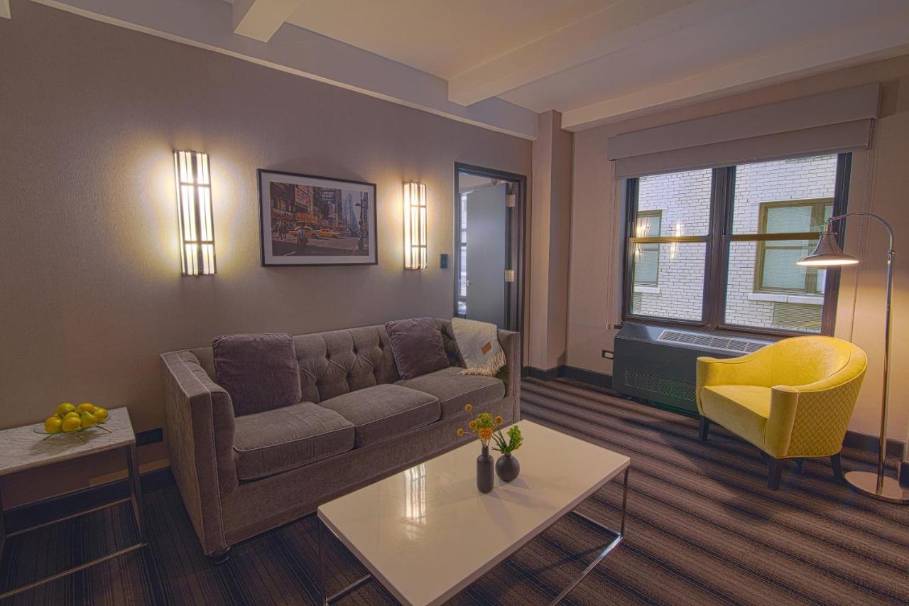 Hotel Edison Times Square New York Exterior photo The living room of a suite at the Westin New York
