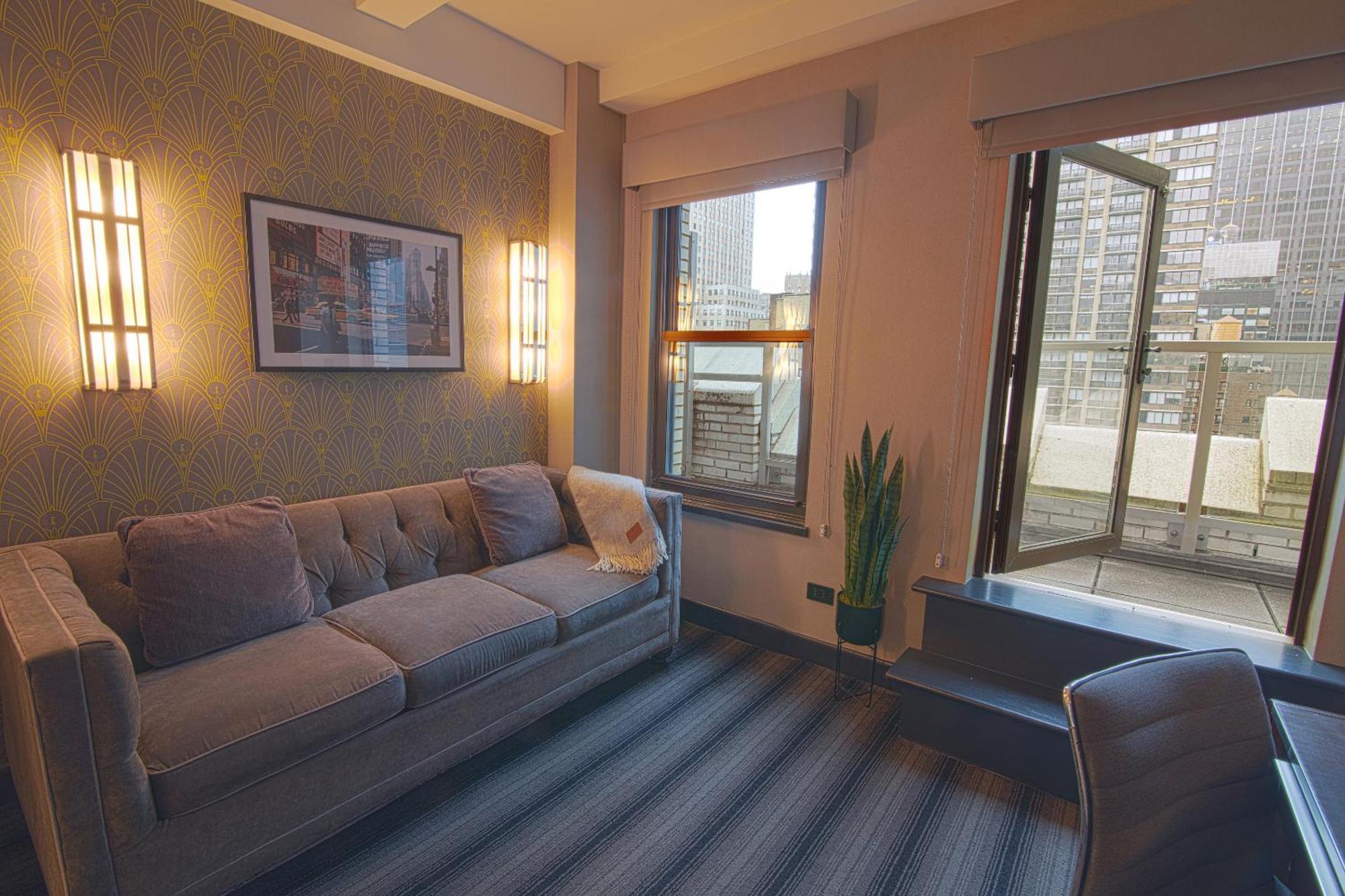 Hotel Edison Times Square New York Room photo The interior of a suite at the hotel